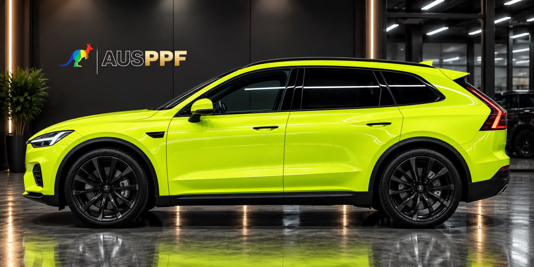 Another view of a vehicle wrapped in AusPPF Acid Green paint protection film, in a showroom.