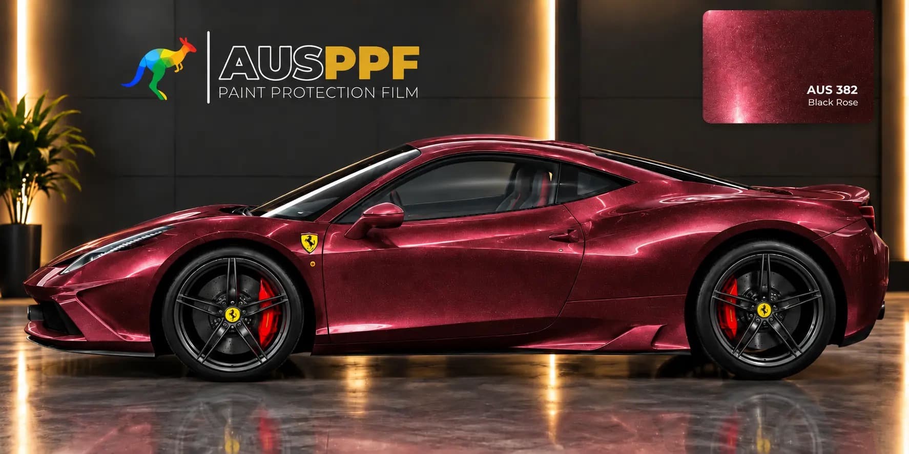 Another view of a vehicle wrapped in AusPPF Black Rose paint protection film, in a showroom.