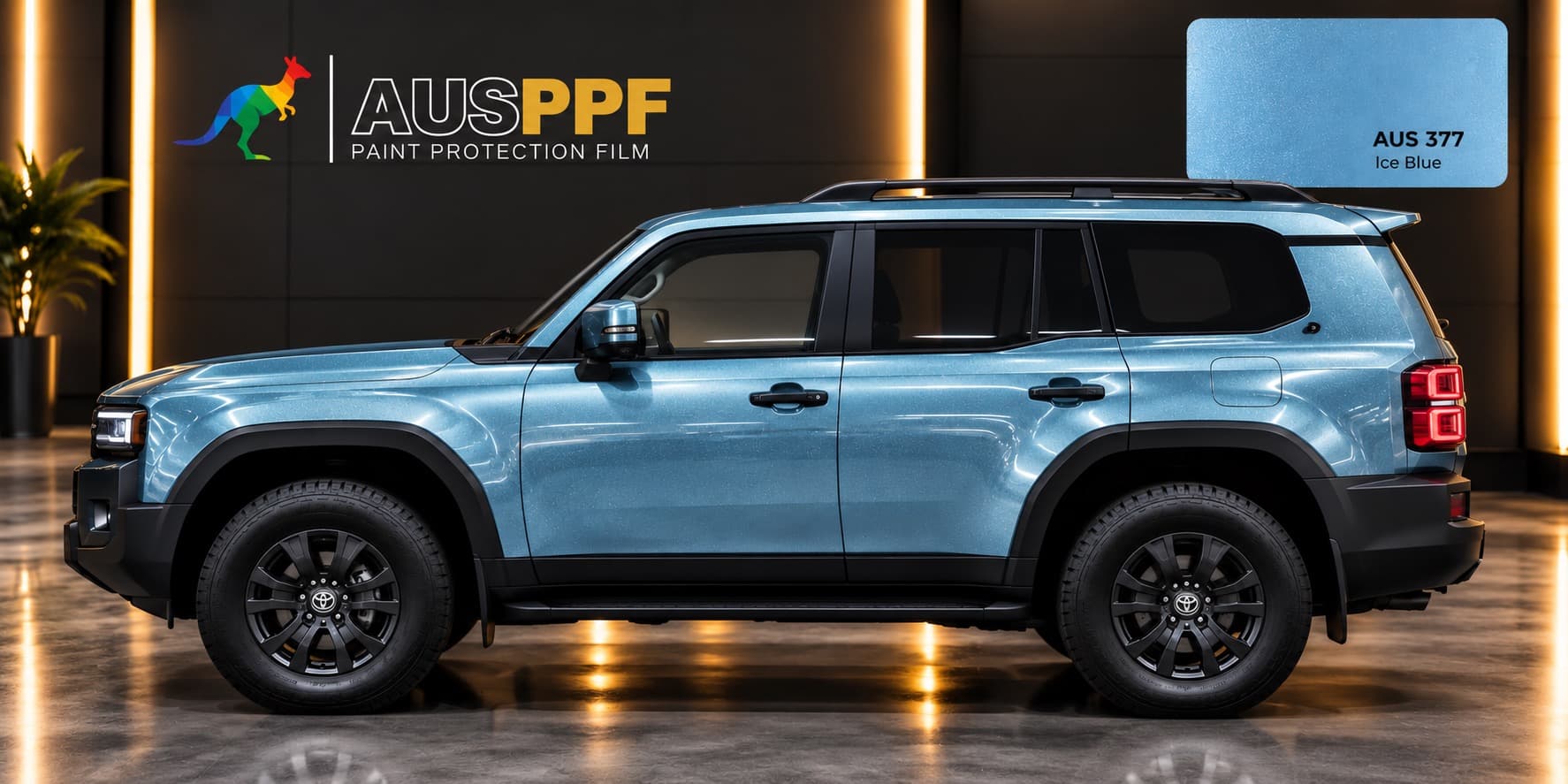 A vehicle wrapped in AusPPF Ice Blue paint protection film, photographed in a showroom.