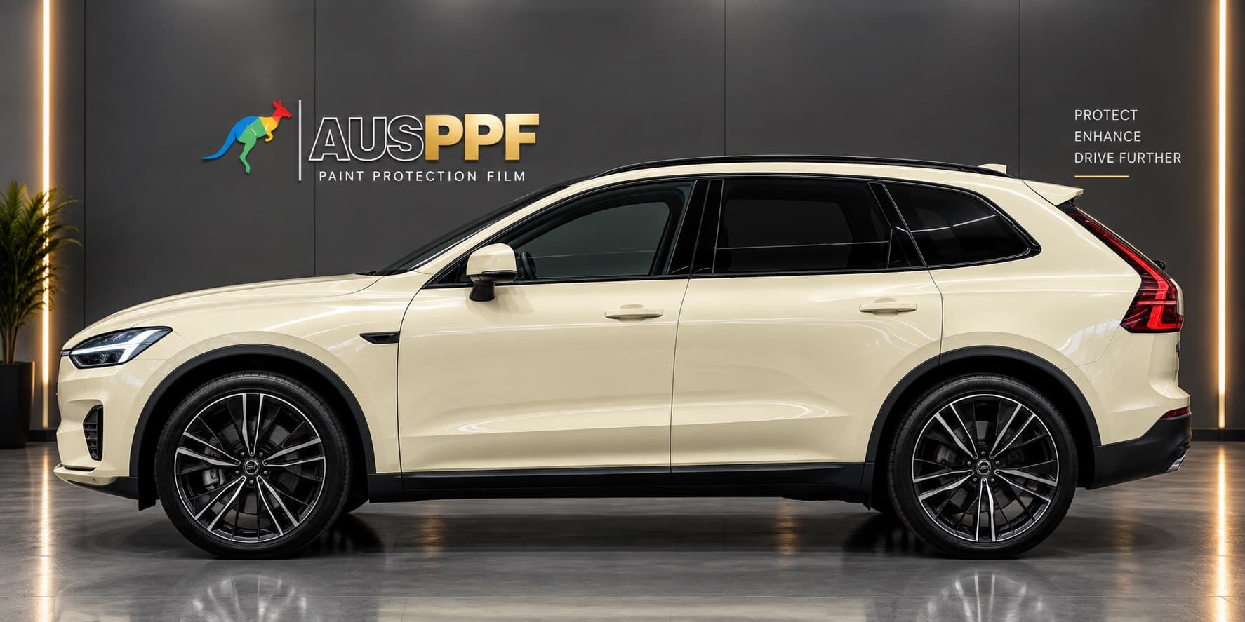 The same SUV wrapped in AusPPF Sahara Yellow paint protection film, side profile in a showroom.