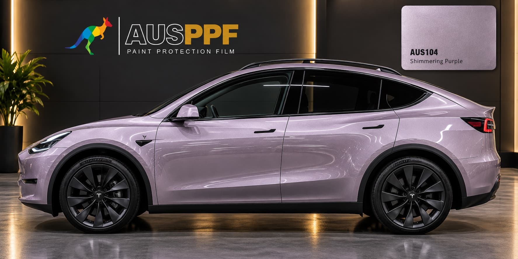 Another view of a vehicle wrapped in AusPPF Shimmering Purple paint protection film, in a showroom.