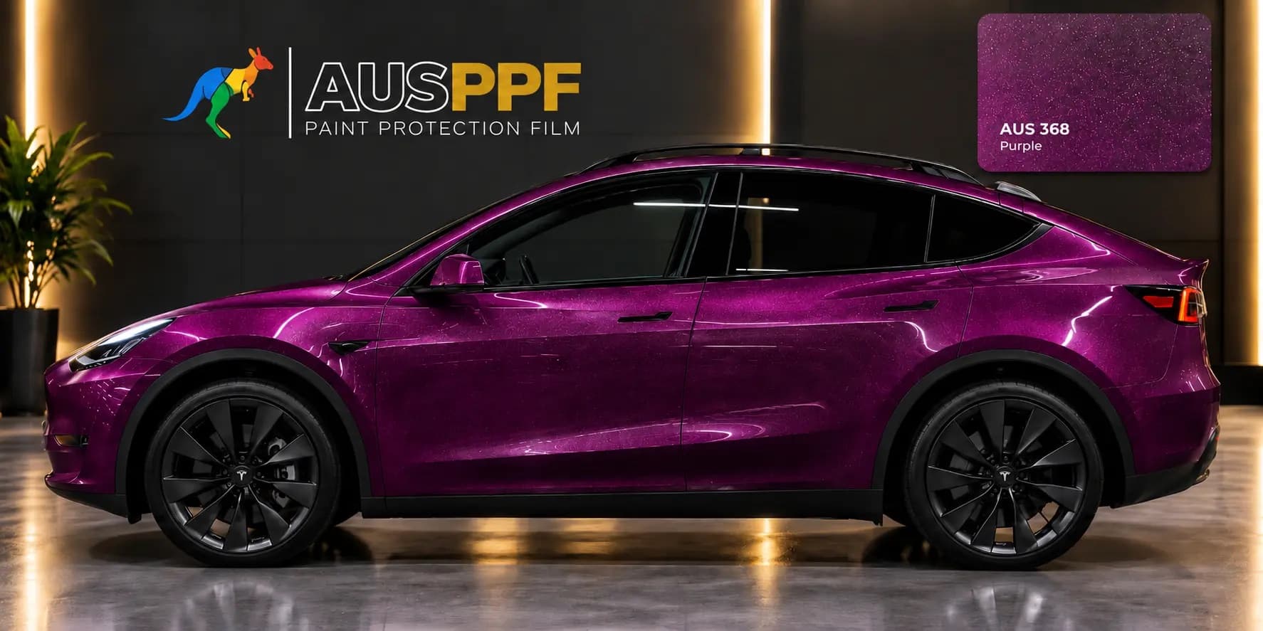 Another view of a vehicle wrapped in AusPPF Purple paint protection film, in a showroom.